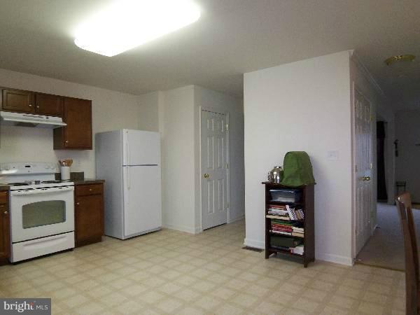 176 Shelby Road Inwood, WV 25428 - Photo 2 of 30 a kitchen with stainless steel appliances a refrigerator and a stove
