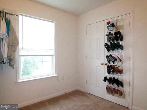 176 Shelby Road Inwood, WV 25428 - Photo 14 of 30 an empty room with a window and a fan