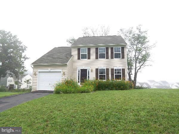 176 Shelby Road Inwood, WV 25428 - Photo 16 of 30 a front view of house with yard and green space