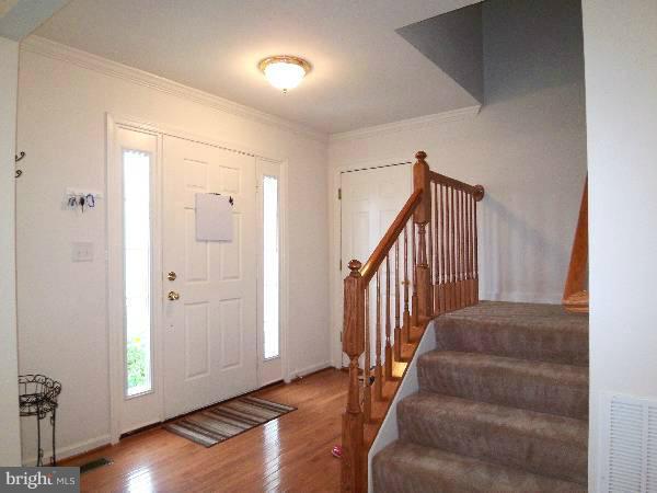 176 Shelby Road Inwood, WV 25428 - Photo 21 of 30 a view of entryway and hall with wooden floor