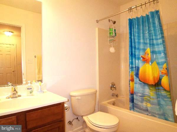 176 Shelby Road Inwood, WV 25428 - Photo 5 of 30 a bathroom with a sink toilet and shower
