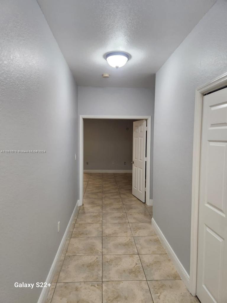 3187 Southwest 143rd Place Miami, FL 33175 - Photo 14 of 19 a view of entryway