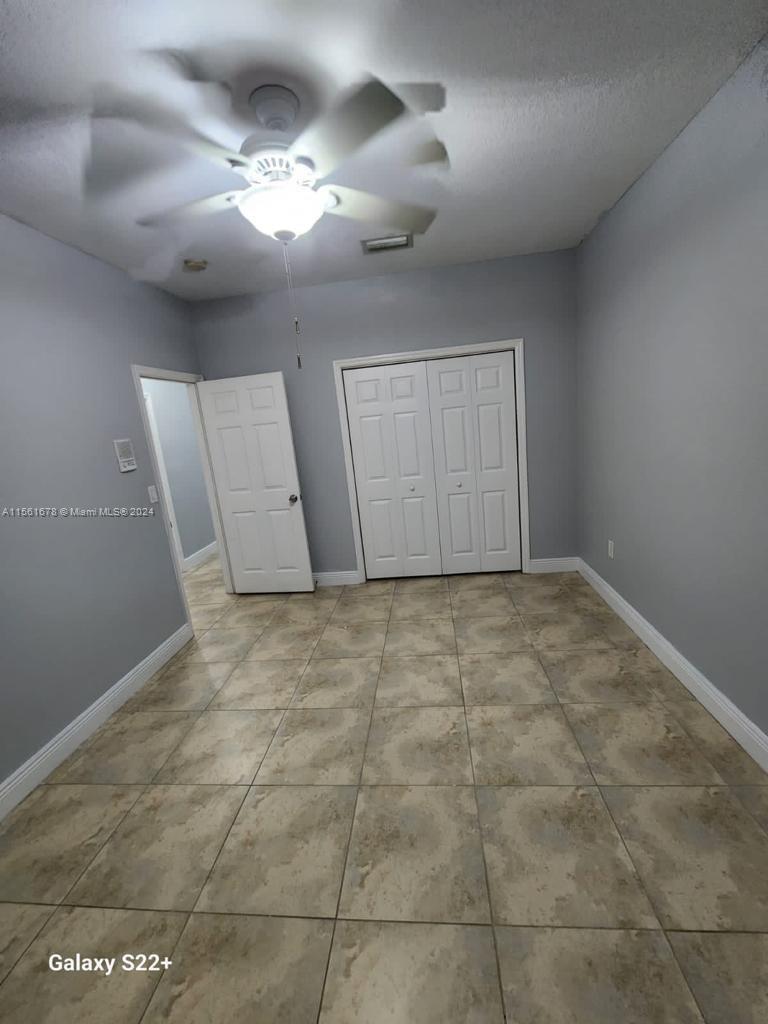 3187 Southwest 143rd Place Miami, FL 33175 - Photo 4 of 19 a view of an empty room