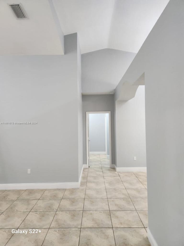 3187 Southwest 143rd Place Miami, FL 33175 - Photo 8 of 19 a view of an empty room
