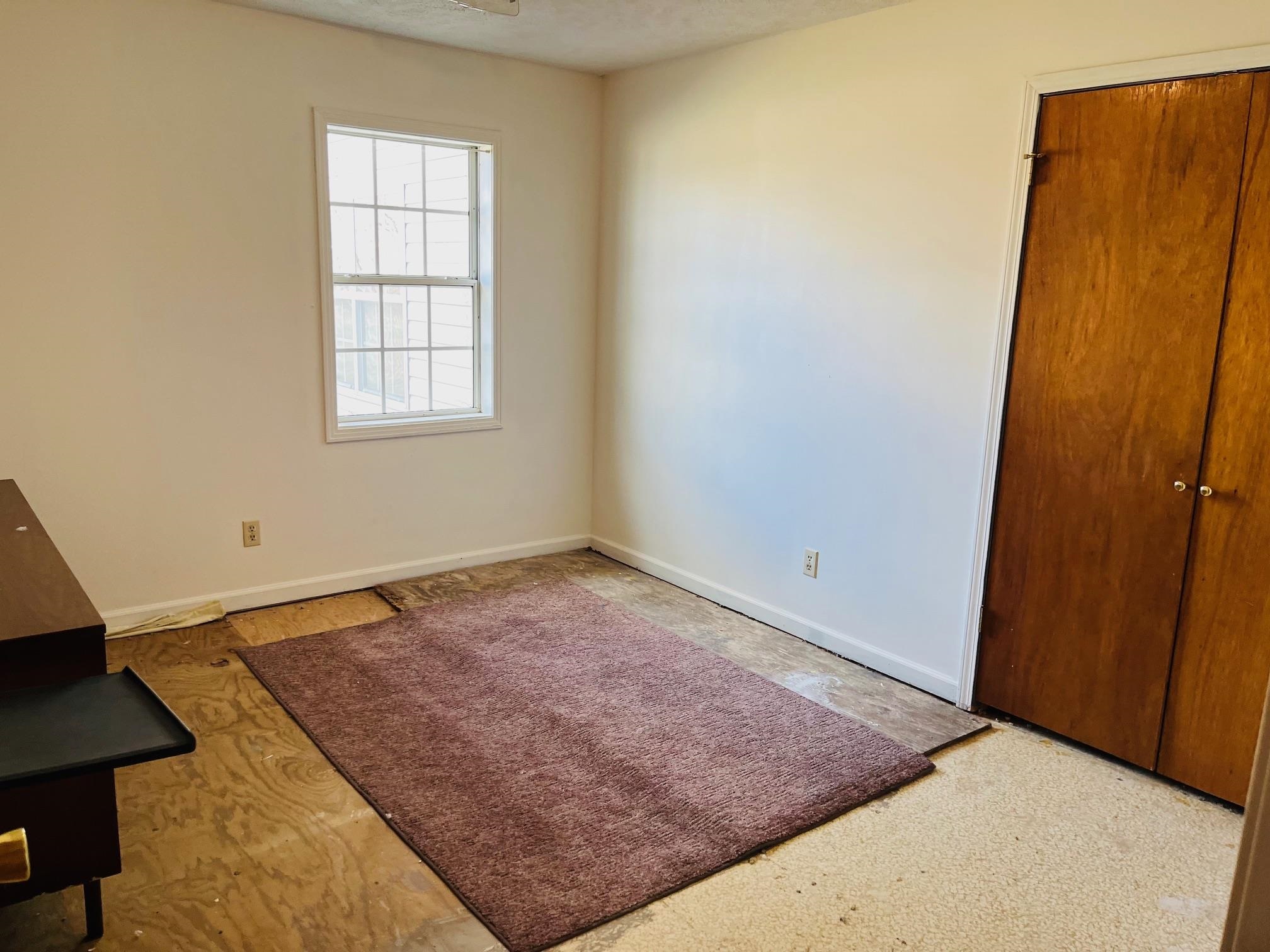 275 Fritton Spur Road Middleton, TN 38052 - Photo 5 of 31 Unfurnished bedroom with baseboards and a closet