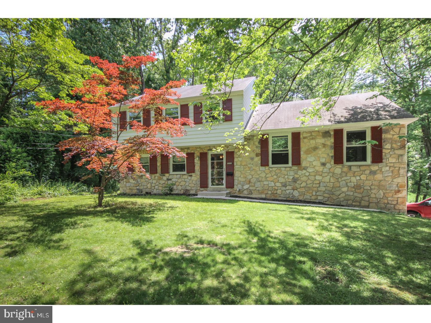 1010 Glen Road Wallingford, PA 19086 - Photo 1 of 20 a front view of a house with a yard