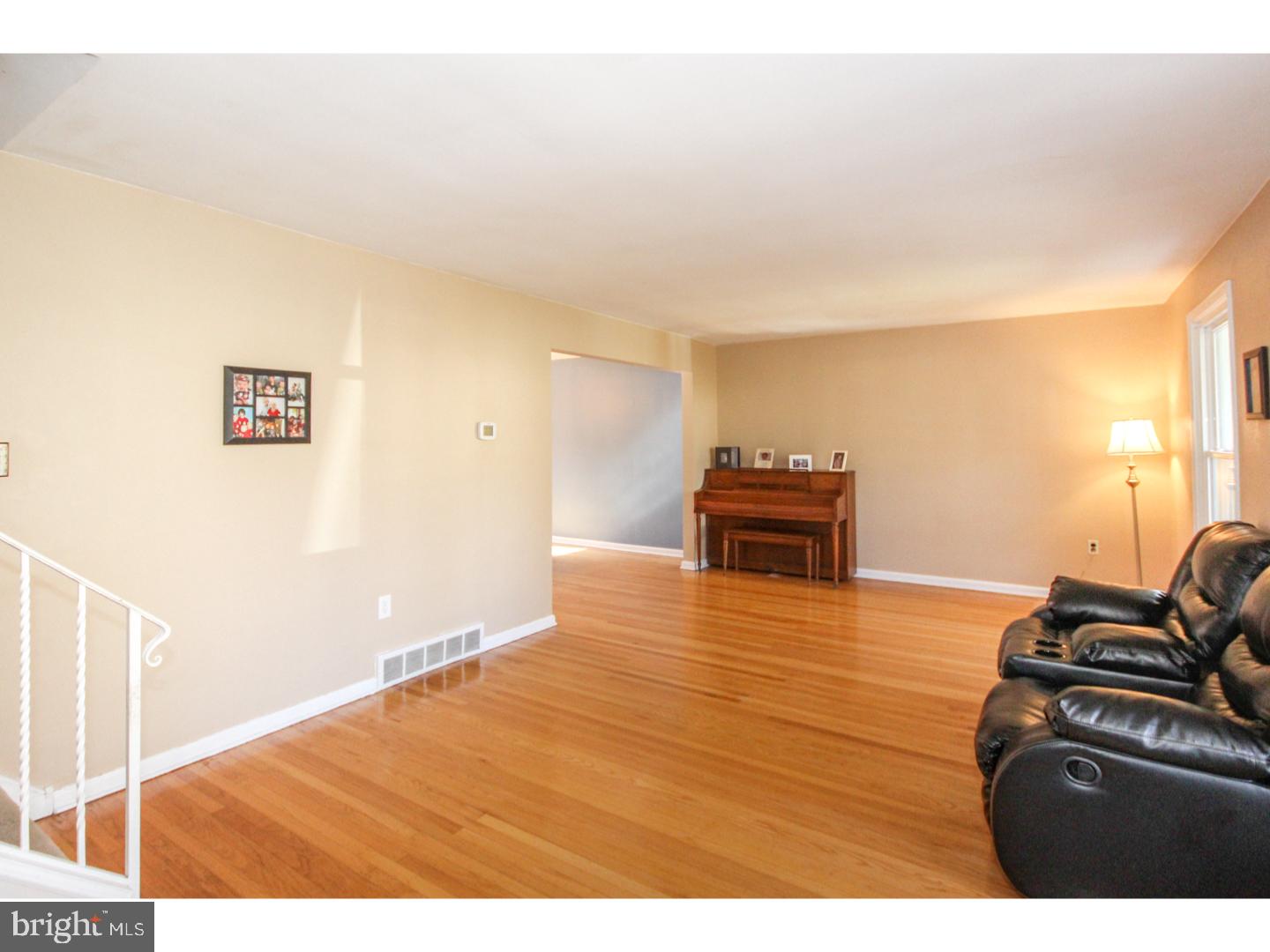 1010 Glen Road Wallingford, PA 19086 - Photo 2 of 20 a bedroom with a bed and a view of kitchen