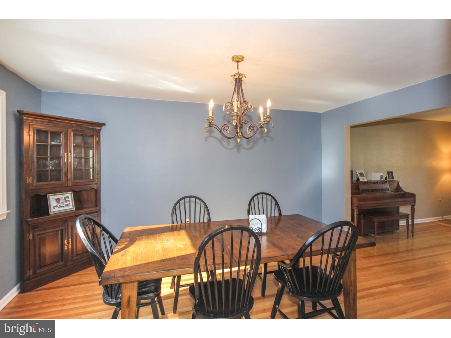 1010 Glen Road Wallingford, PA 19086 - Photo 4 of 20 a view of a dining room with furniture and chandelier