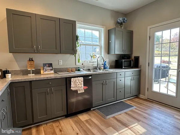 a bedroom with a bed and a chair