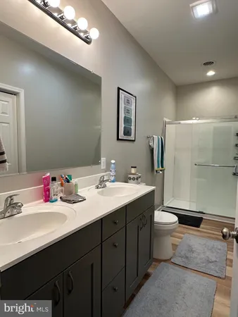 a view of workspace with wooden floor