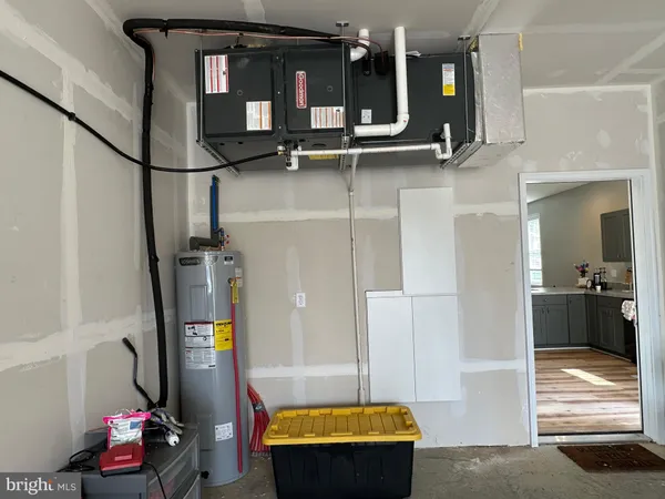 a view of a chairs and table in the balcony