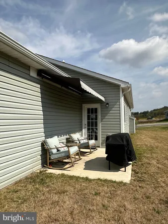 a view of a street with a yard