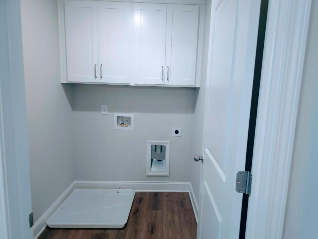 4240 Cavalier Way Duluth, GA 30097 - Photo 18 of 46 a view of cabinets and wooden floor