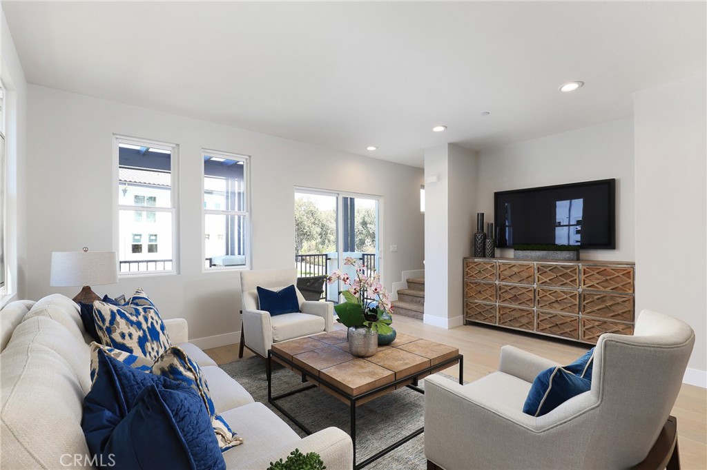 11 Oakmont Lane Phillips Ranch, CA 91766 - Photo 12 of 63 a living room with furniture and a flat screen tv
