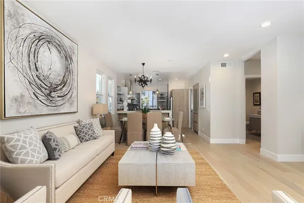 a spacious bedroom with a large bed and a large window