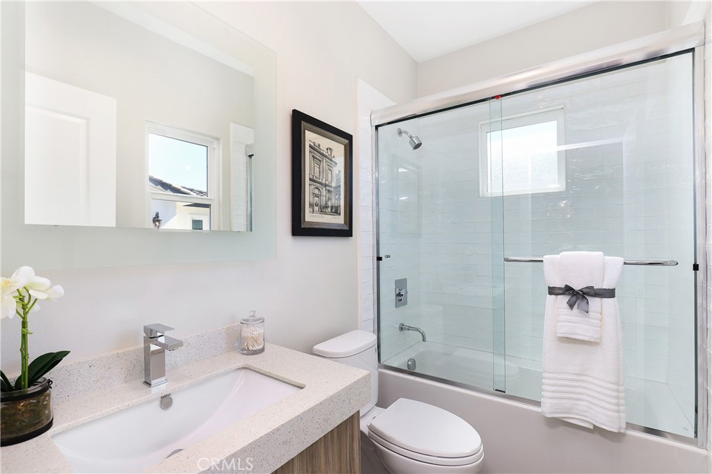 11 Oakmont Lane Phillips Ranch, CA 91766 - Photo 45 of 63 a bathroom with a sink toilet and shower