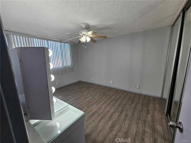 a view of a livingroom with wooden floor
