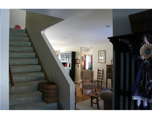 3 High Meadow Road Little Compton, RI 02837 - Photo 18 of 20 Entry. taken from the front door. Stairs leading up to 2nd floor and front living room pictured.