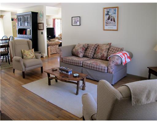 3 High Meadow Road Little Compton, RI 02837 - Photo 9 of 20 Living Room. This is the front living room which is located directly next to the dining room.