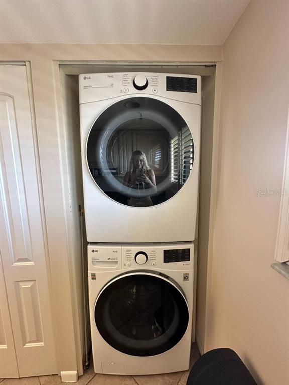 401 150th Avenue, Unit 266 Madeira Beach, FL 33708 - Photo 19 of 46 a utility room with dryer and washer