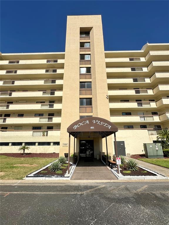 401 150th Avenue, Unit 266 Madeira Beach, FL 33708 - Photo 2 of 46 a view of a building from a patio
