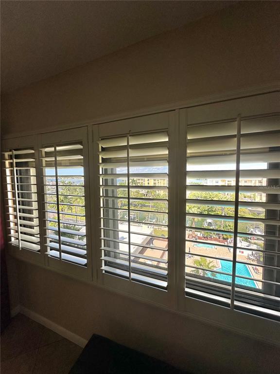 401 150th Avenue, Unit 266 Madeira Beach, FL 33708 - Photo 23 of 46 a view of empty room with windows