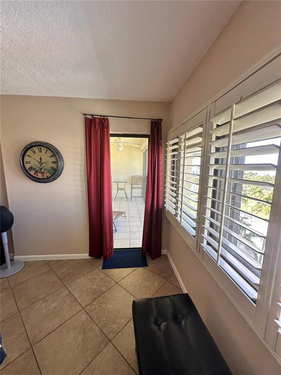401 150th Avenue, Unit 266 Madeira Beach, FL 33708 - Photo 24 of 46 a view of an empty room with a window