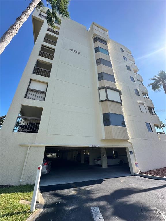 401 150th Avenue, Unit 266 Madeira Beach, FL 33708 - Photo 3 of 46 a view of staircase with white walls