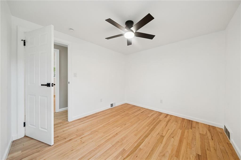 1714 O'Block Road Pittsburgh, PA 15239 - Photo 21 of 36 a view of empty room with wooden floor