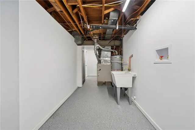 a view of a hallway with seating area