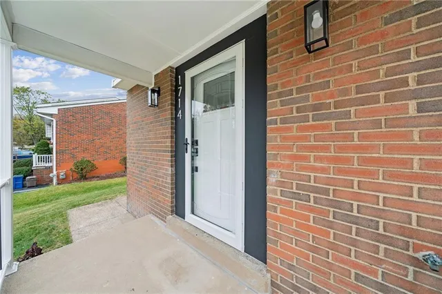 a bathroom with a shower and a yard