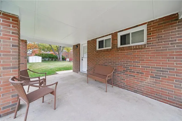a couple of chairs in a patio
