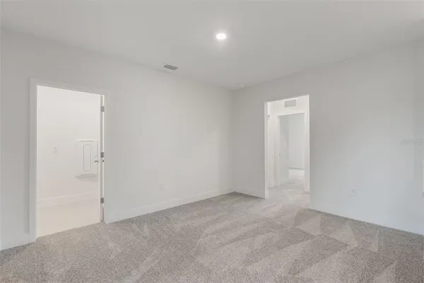 an empty room with an entryway
