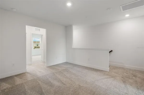 an empty room with an entryway