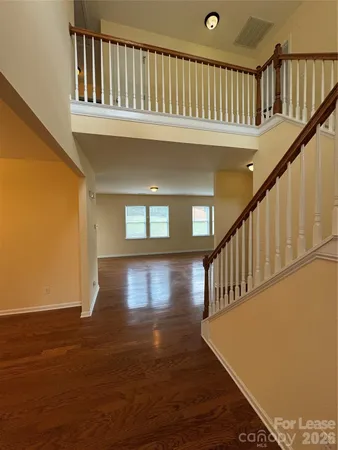 a view of entryway with wooden floor