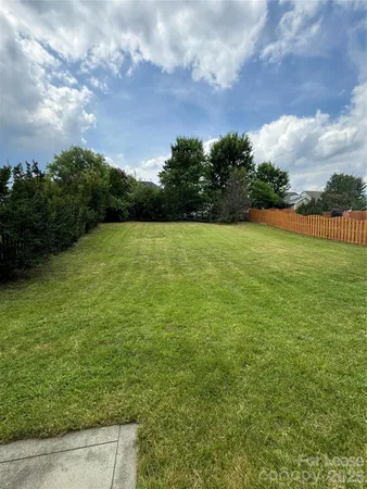 a view of a field with an outdoor space