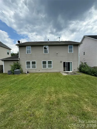 a view of a yard in front of a house