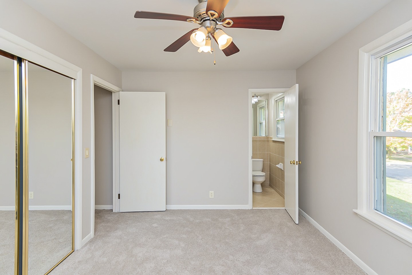 3121 Boulder Park Drive Nashville, TN 37214 - Photo 13 of 20 a view of an empty room with window and chandelier fan