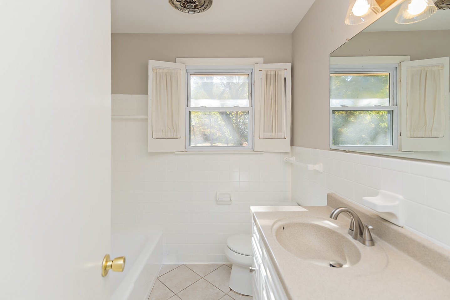 3121 Boulder Park Drive Nashville, TN 37214 - Photo 14 of 20 a bathroom with a sink a toilet and a mirror