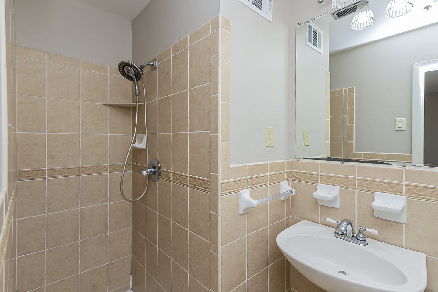 3121 Boulder Park Drive Nashville, TN 37214 - Photo 16 of 20 a bathroom with a sink toilet and shower