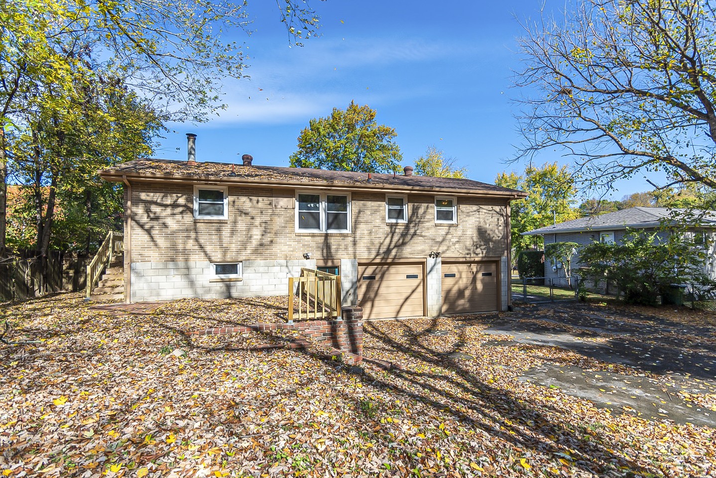 3121 Boulder Park Drive Nashville, TN 37214 - Photo 18 of 20 a view of backyard with a table and chairs and potted plants
