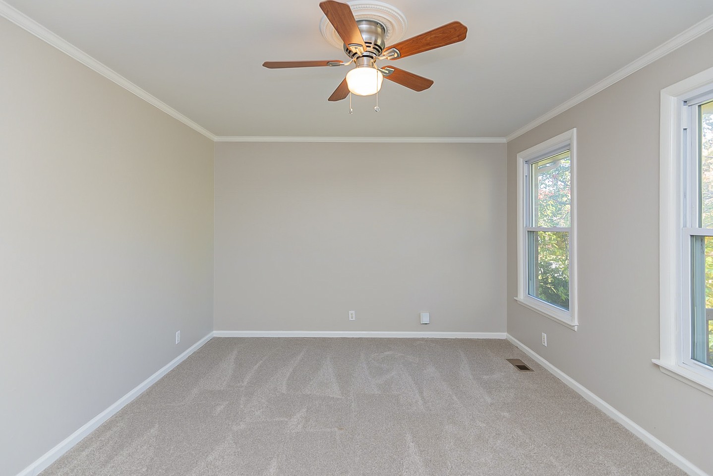 3121 Boulder Park Drive Nashville, TN 37214 - Photo 3 of 20 an empty room with a window and a fan
