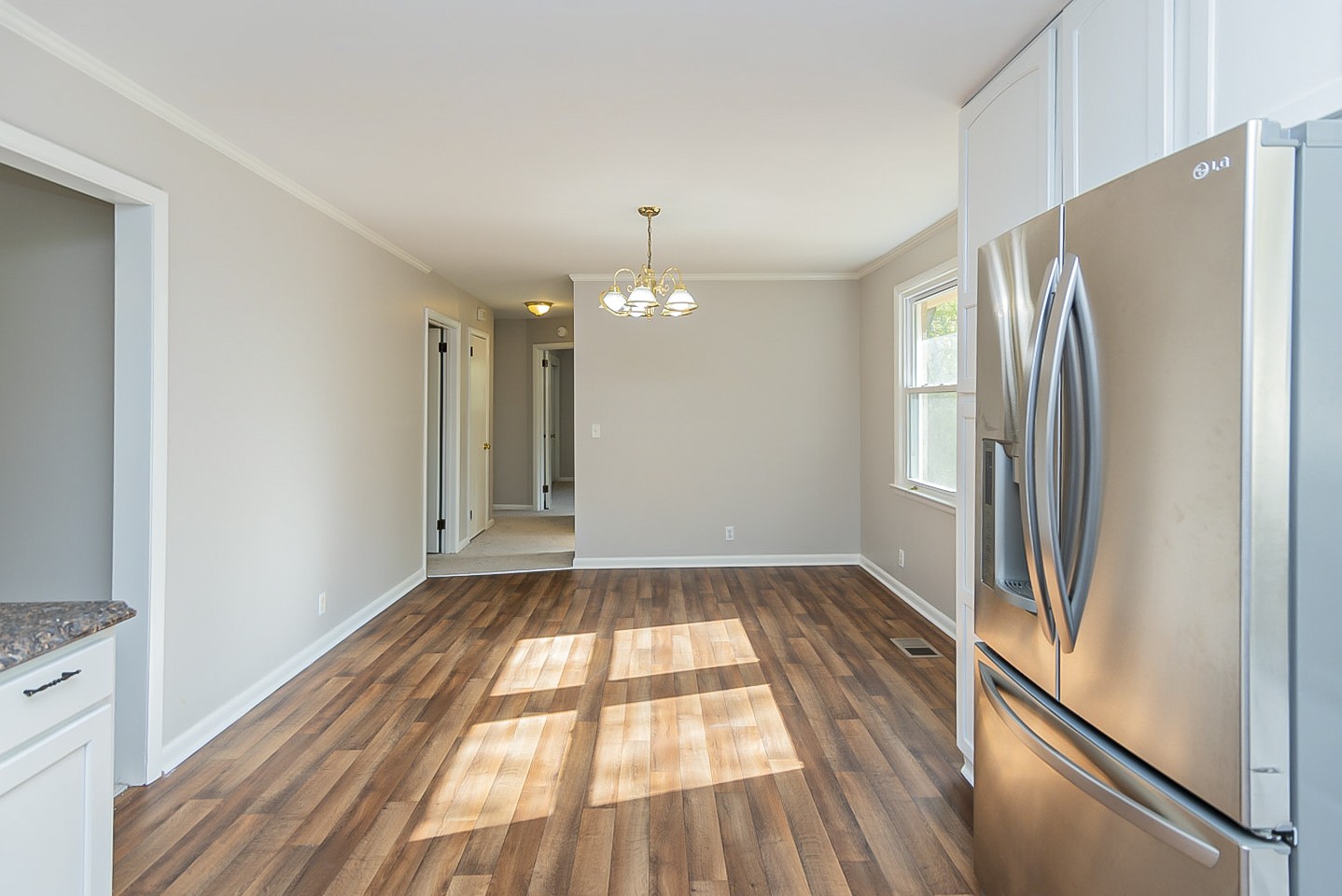 3121 Boulder Park Drive Nashville, TN 37214 - Photo 5 of 20 a view of empty room with wooden floor and fan