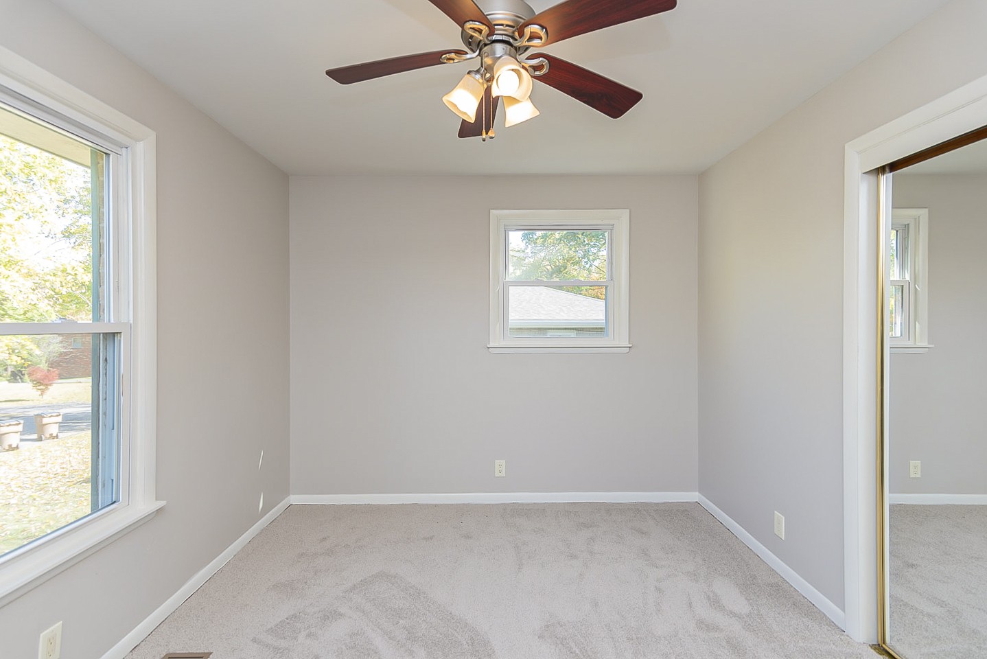 3121 Boulder Park Drive Nashville, TN 37214 - Photo 8 of 20 an empty room with windows and fan