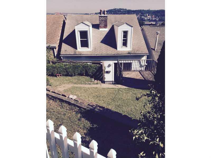 1923 Mt Troy Road Pittsburgh, PA 15212 - Photo 1 of 11 Exterior Back. On street parking is available in the rear of the home on Luty Ave.
