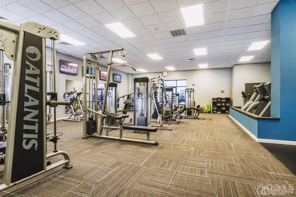 125 West Main Street, Unit 316 Somerville, NJ 08876 - Photo 4 of 17 a view of a room with gym equipment