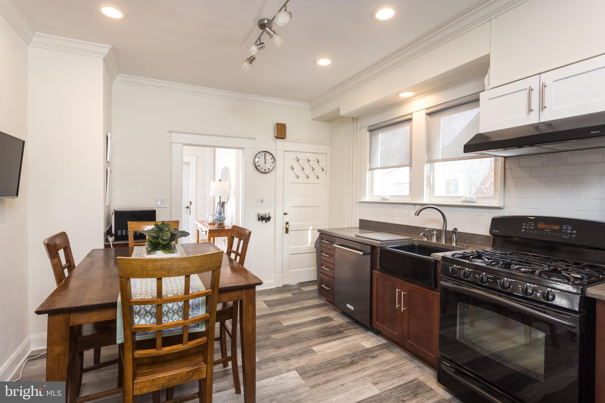 625 Dunkirk Road Baltimore, MD 21212 - Photo 11 of 39 Modern kitchen with warm, inviting tones.