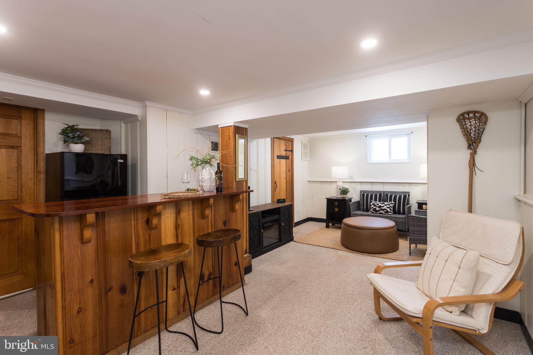 625 Dunkirk Road Baltimore, MD 21212 - Photo 26 of 39 Cozy basement retreat with rustic charm.