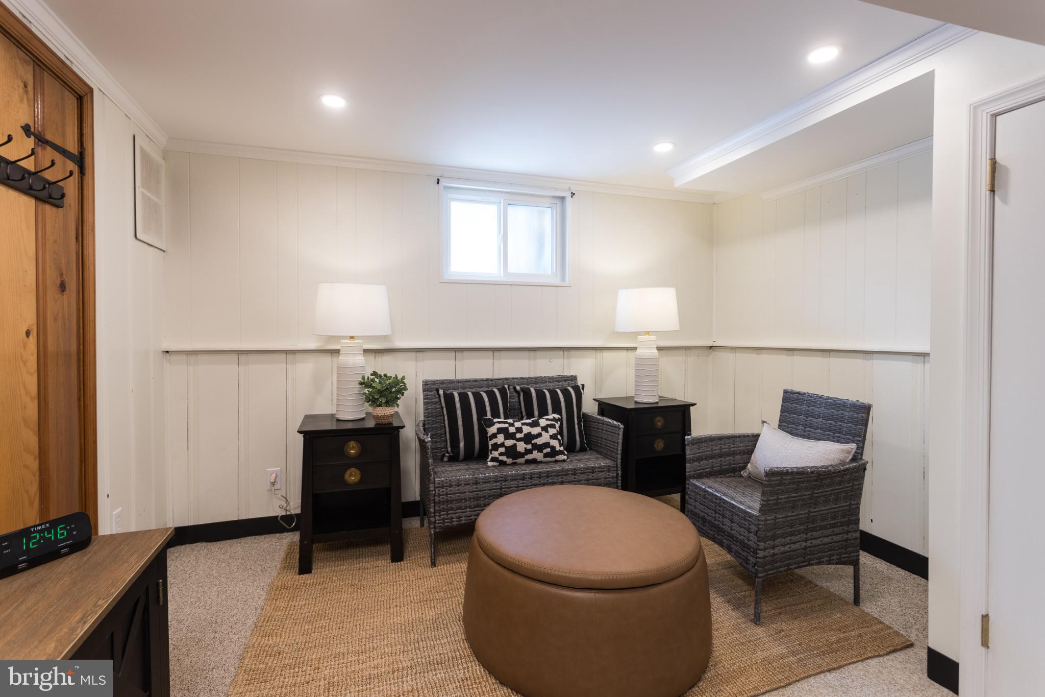 625 Dunkirk Road Baltimore, MD 21212 - Photo 29 of 39 Cozy basement retreat with natural light.