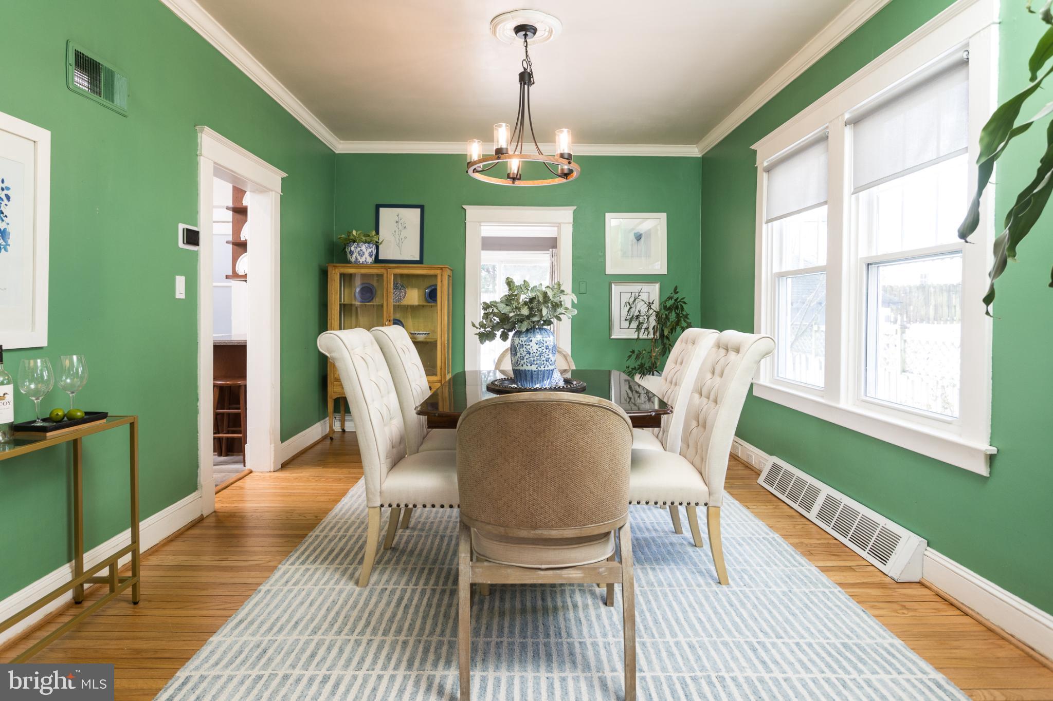 625 Dunkirk Road Baltimore, MD 21212 - Photo 8 of 39 Vibrant green dining space with natural light.